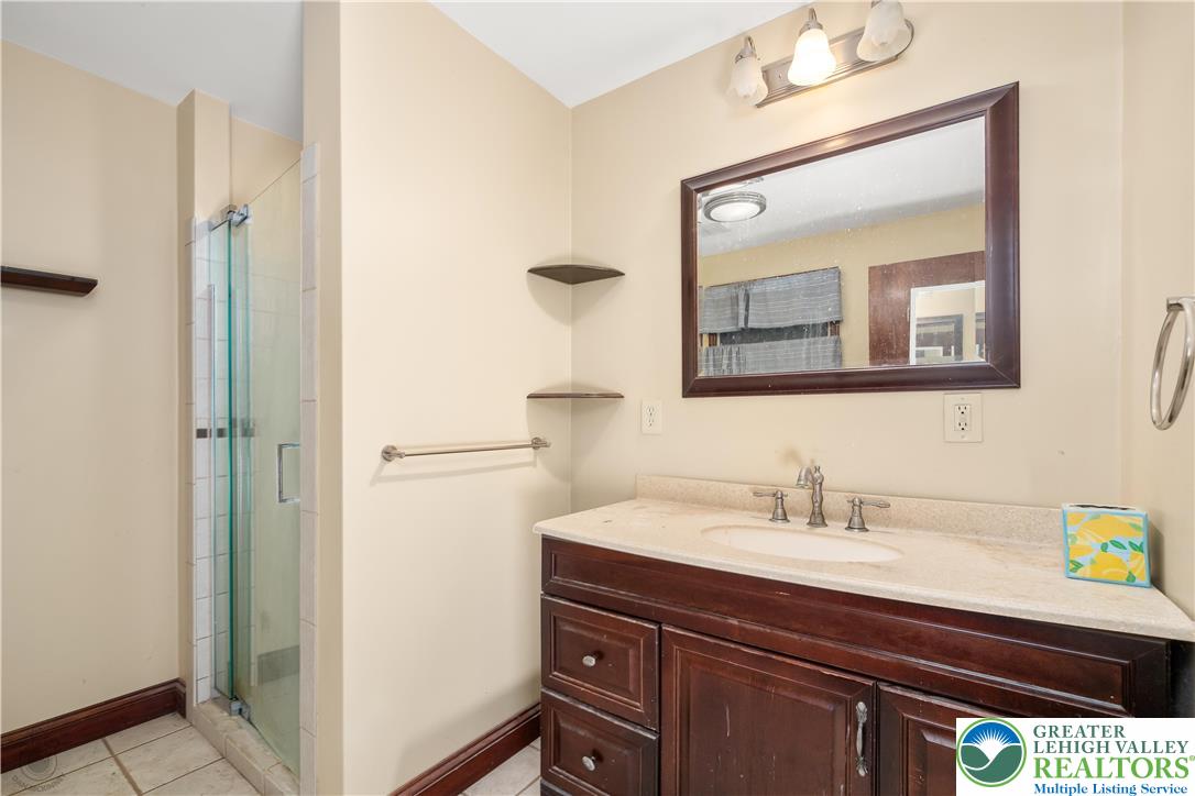 120 Royal Manor Road Easton, PA 18042 - Photo 17 of 49 a bathroom with a sink and a mirror