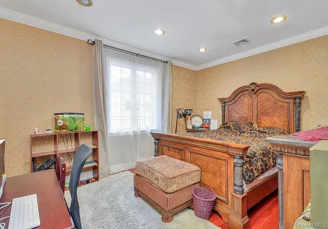 a living room with furniture a rug and a window
