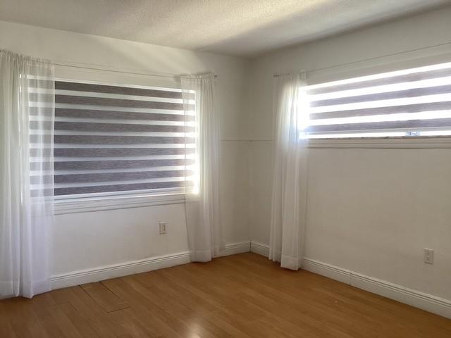 1101 Northeast 191st Street, Unit H301 Miami, FL 33179 - Photo 15 of 18 a view of storage and utility room with a window