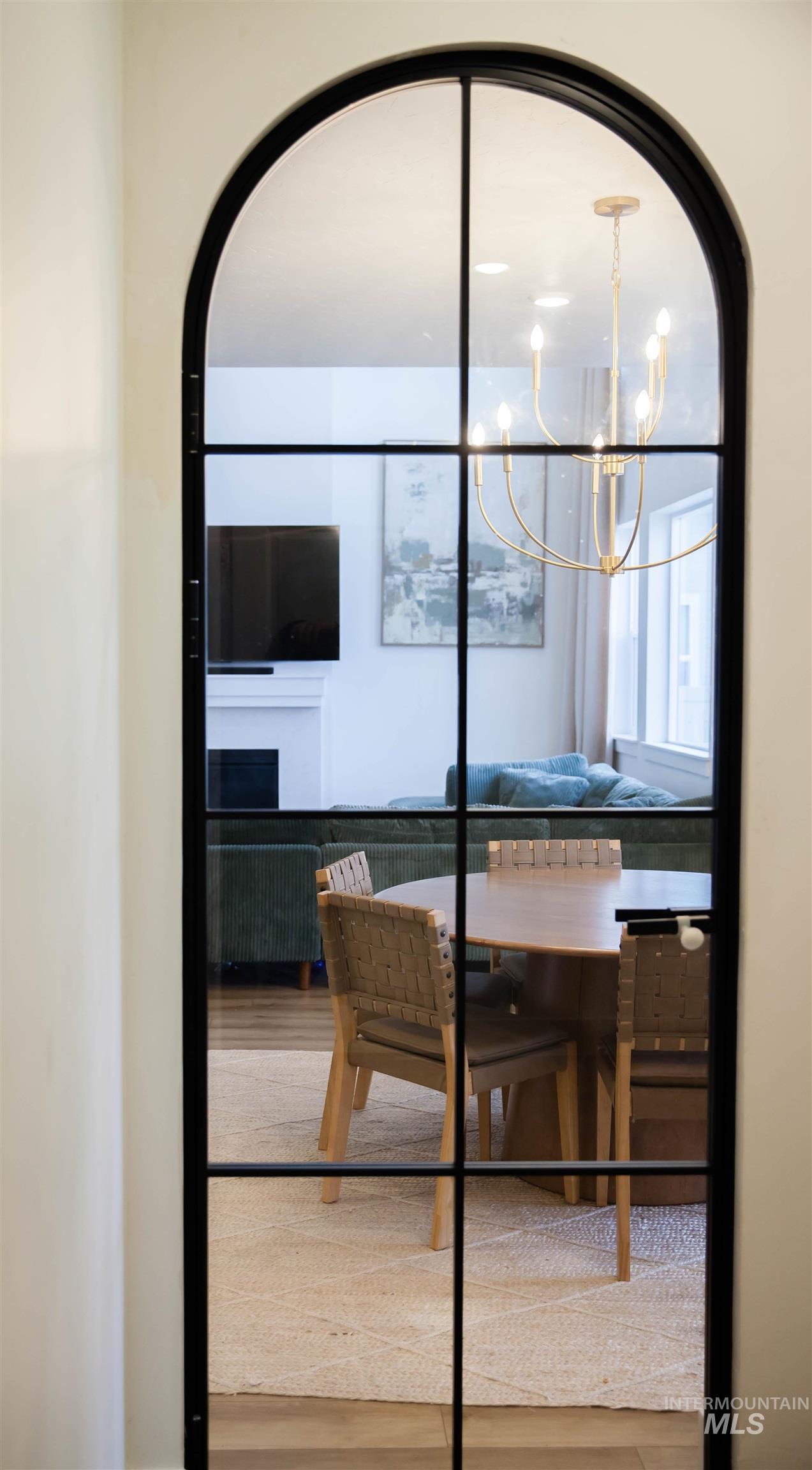 151 Insight Court Middleton, ID 83644 - Photo 14 of 35 Detailed view of hanging lights and wood finished floors