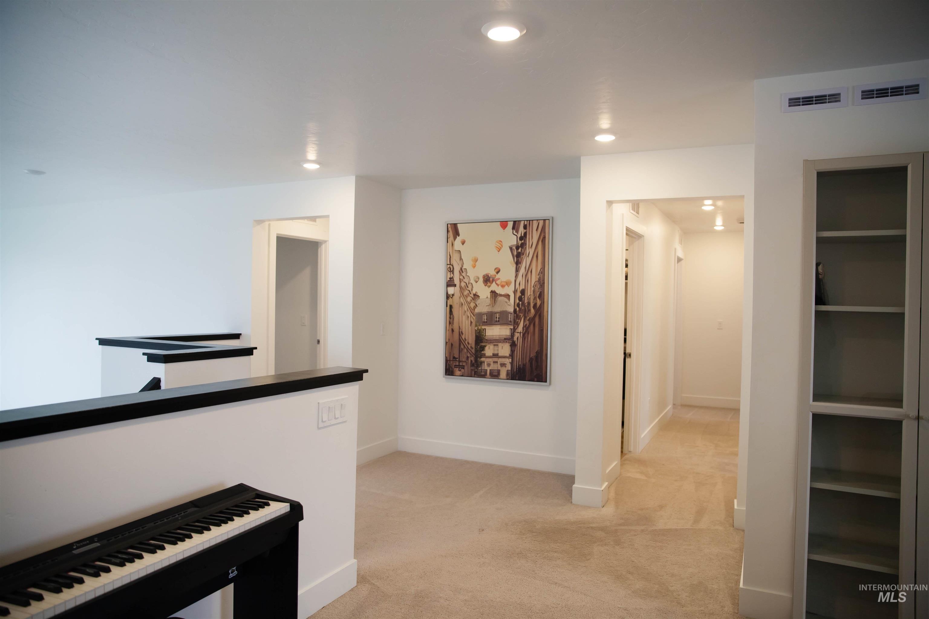 151 Insight Court Middleton, ID 83644 - Photo 18 of 35 Corridor featuring recessed lighting and light carpet