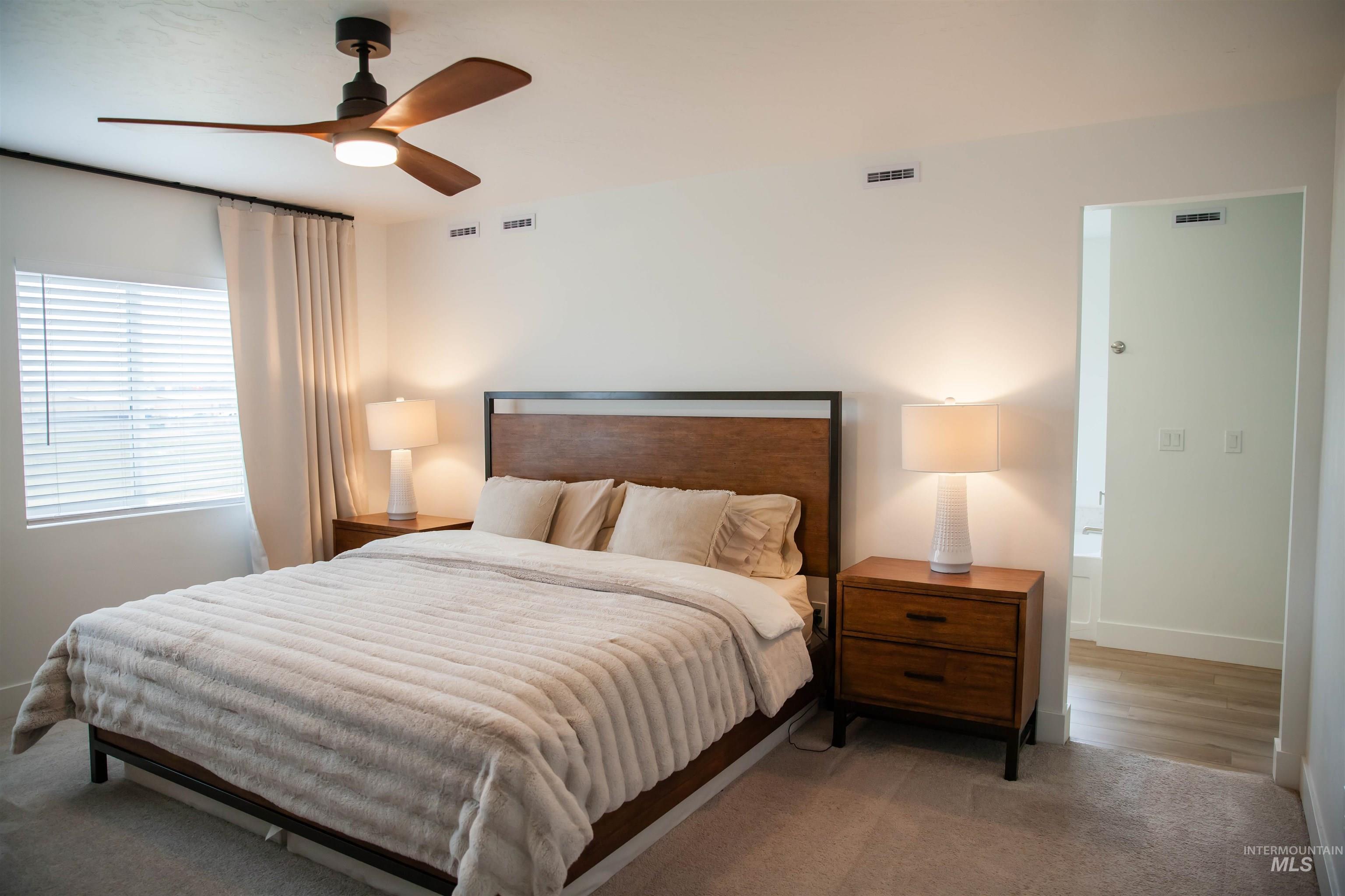 151 Insight Court Middleton, ID 83644 - Photo 19 of 35 Bedroom featuring carpet flooring and a ceiling fan