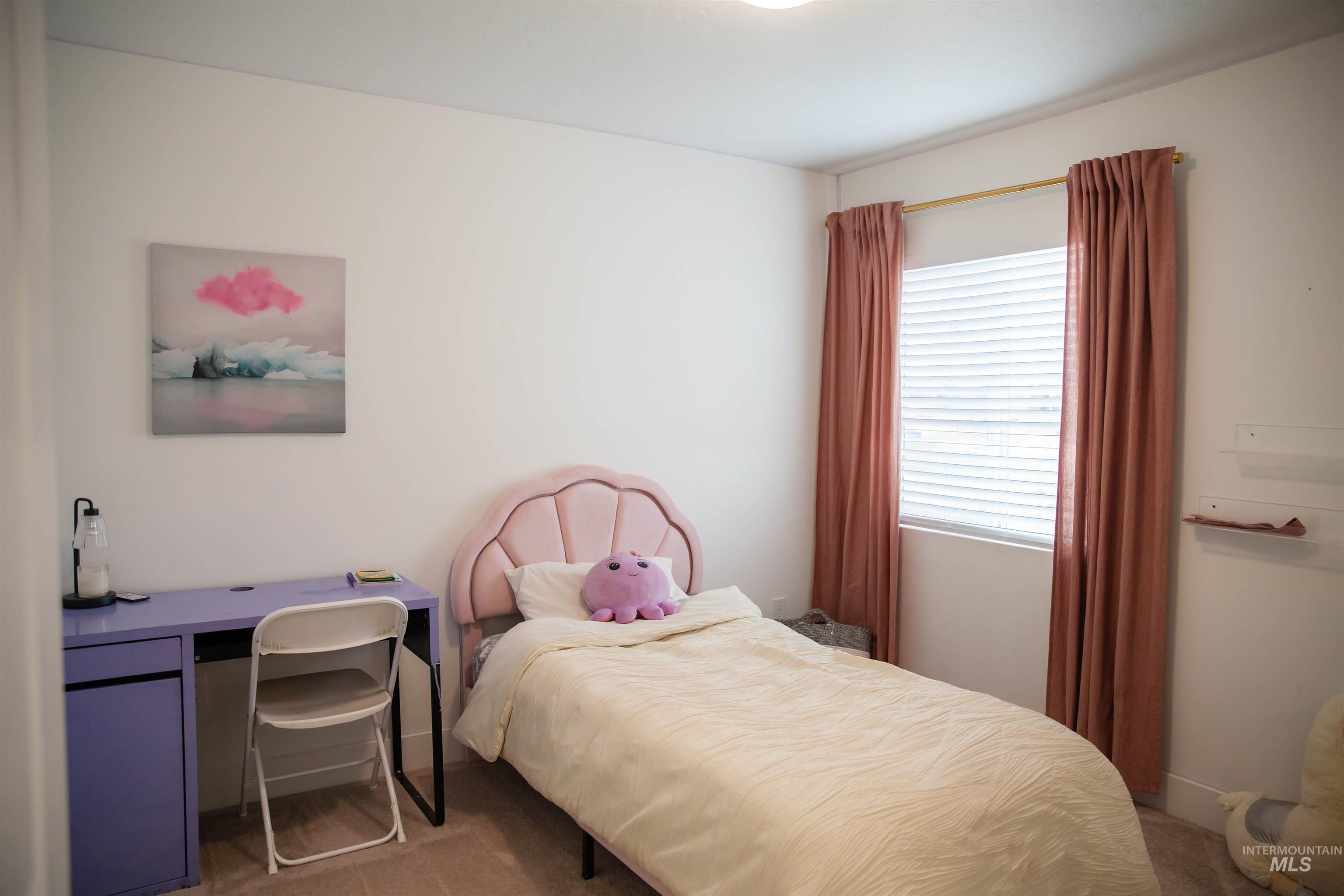151 Insight Court Middleton, ID 83644 - Photo 27 of 35 Carpeted bedroom featuring a desk