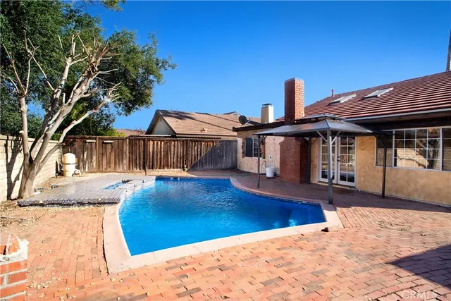 a view of a house with a swimming pool
