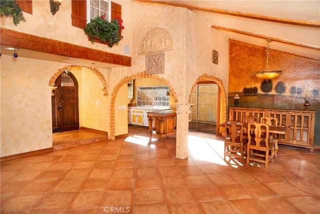 a view of a terrace with outdoor seating