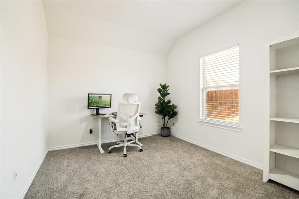 609 Nature Stroll Road Lavon, TX 75166 - Photo 8 of 13 Carpeted room featuring white walls, a single window with blinds, and a built-in shelving unit