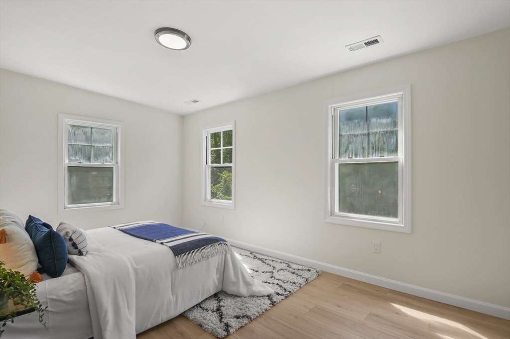 128 Dana Road Oxford, MA 01540 - Photo 11 of 23 a bedroom with a bed and a window