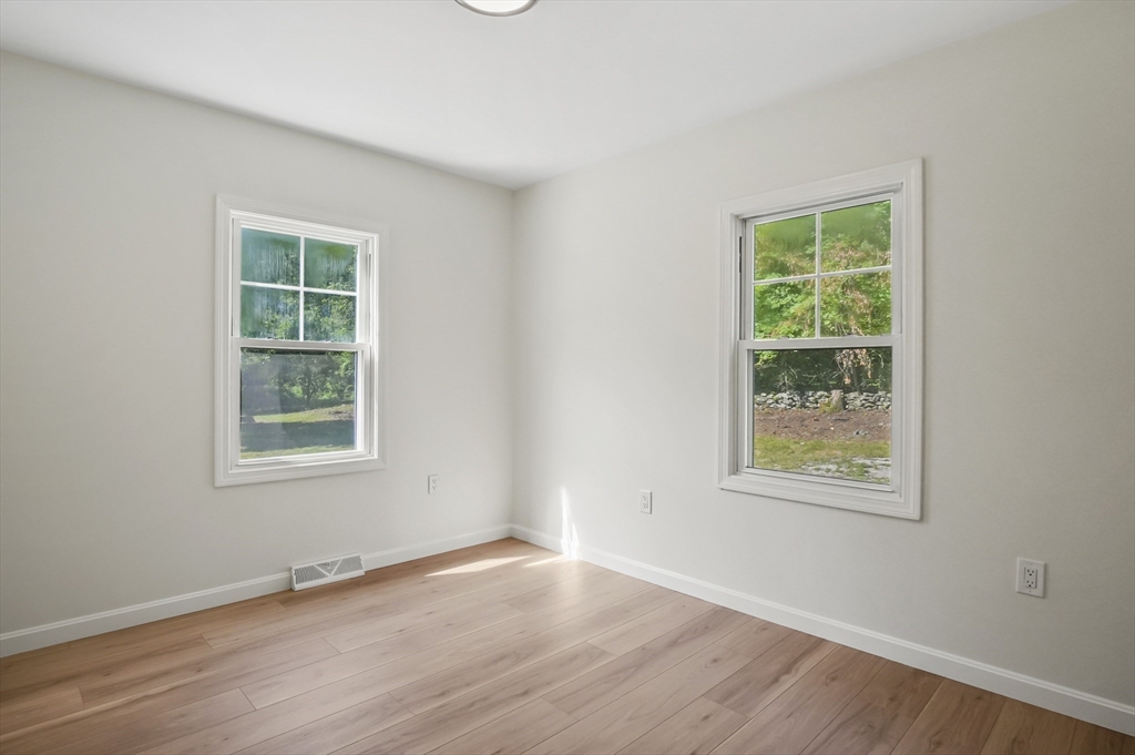 128 Dana Road Oxford, MA 01540 - Photo 13 of 23 an empty room with a window