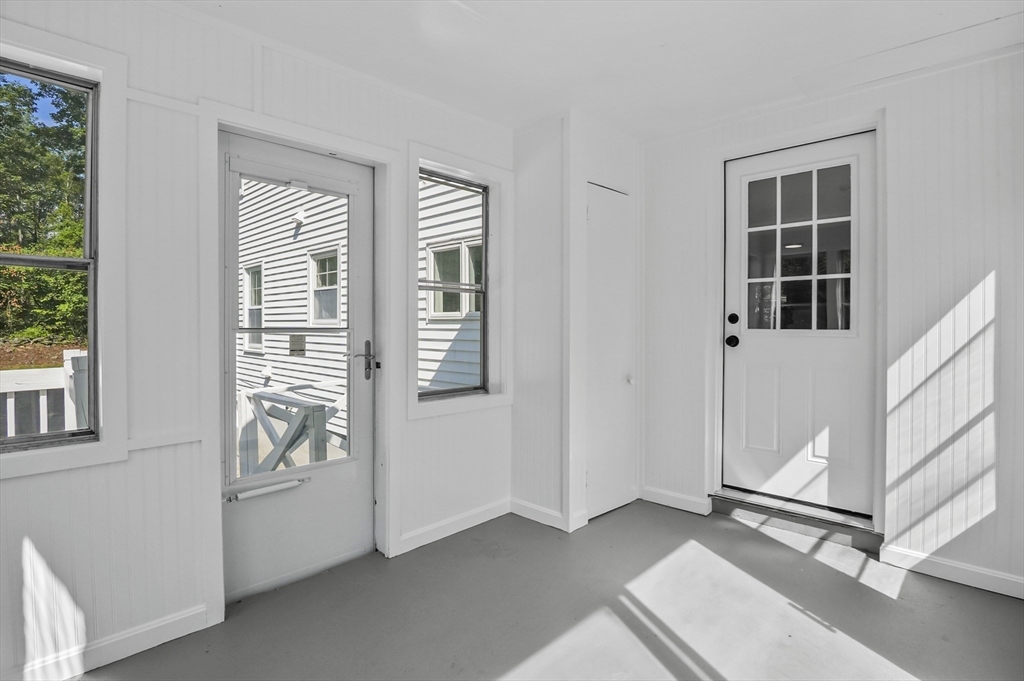 128 Dana Road Oxford, MA 01540 - Photo 19 of 23 a view of an empty room with windows