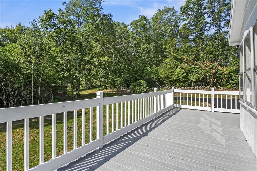 128 Dana Road Oxford, MA 01540 - Photo 20 of 23 a view of balcony with deck and trees