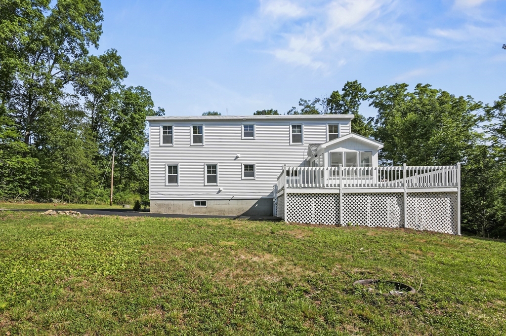 128 Dana Road Oxford, MA 01540 - Photo 21 of 23 a house view with a outdoor space