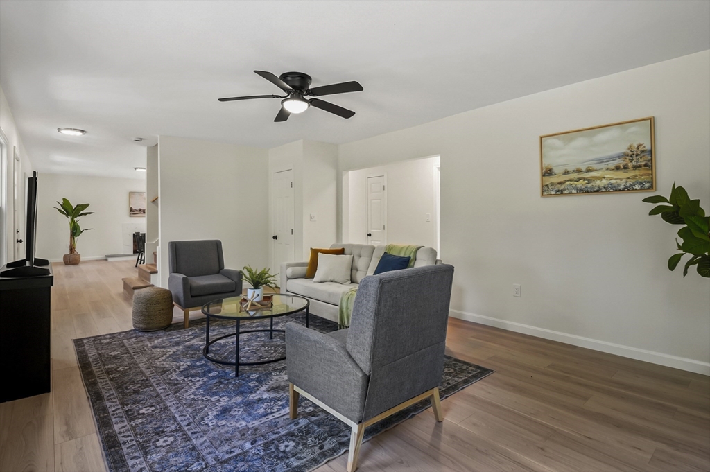 128 Dana Road Oxford, MA 01540 - Photo 5 of 23 a living room with furniture and a wooden floor