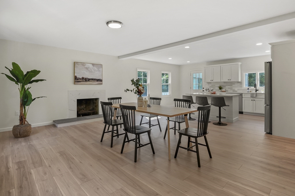 128 Dana Road Oxford, MA 01540 - Photo 7 of 23 a view of a dining room with furniture and wooden floor