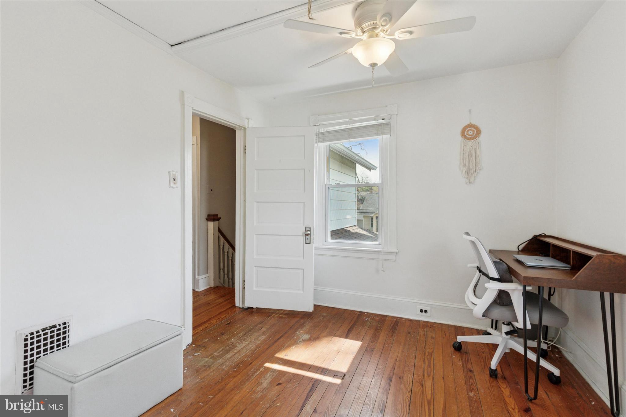 326 Maple Avenue Glenside, PA 19038 - Photo 19 of 25 a view of a workspace with furniture and wooden floor