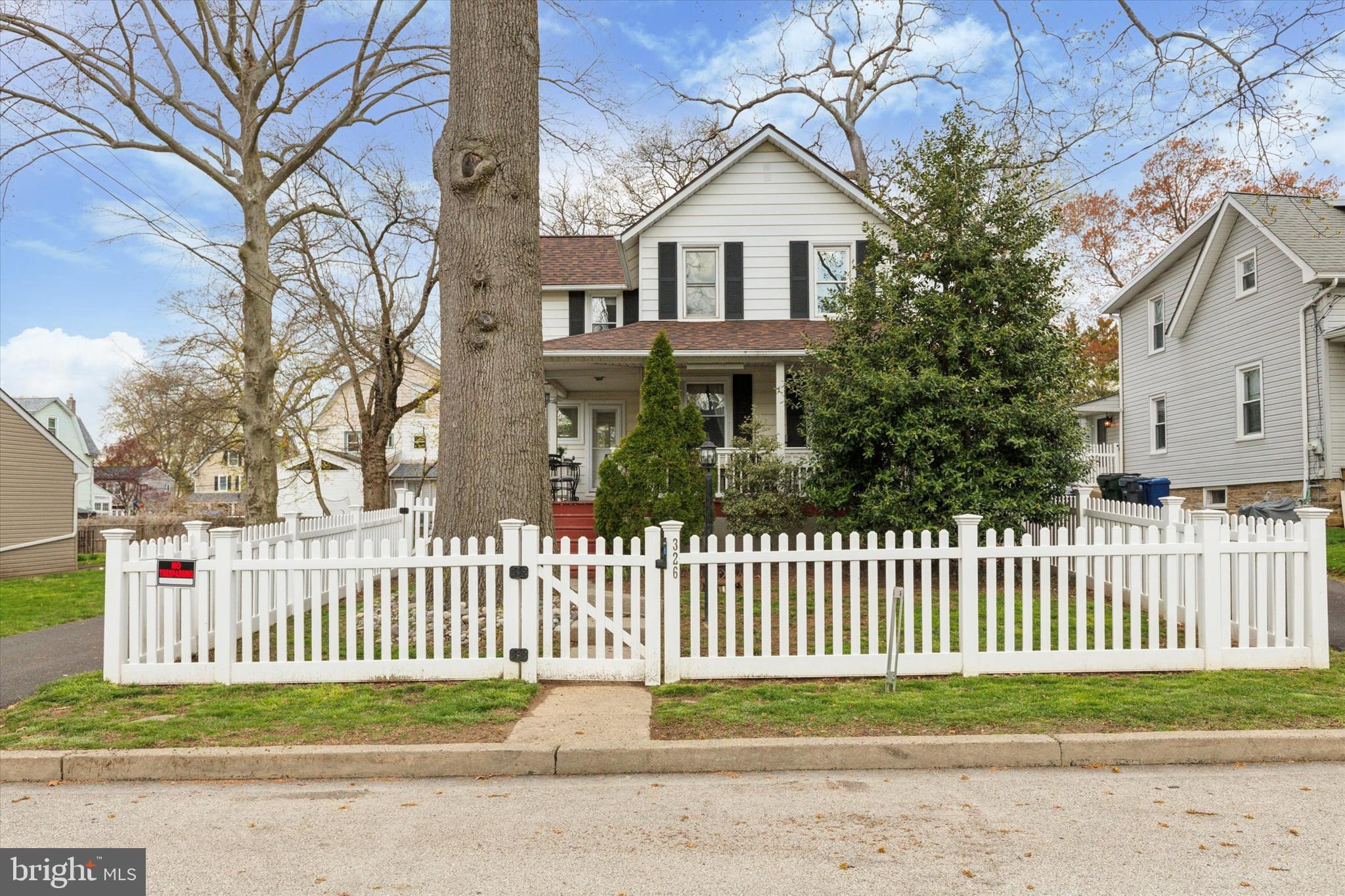 326 Maple Avenue Glenside, PA 19038 - Photo 2 of 25 a front view of a house with a garden