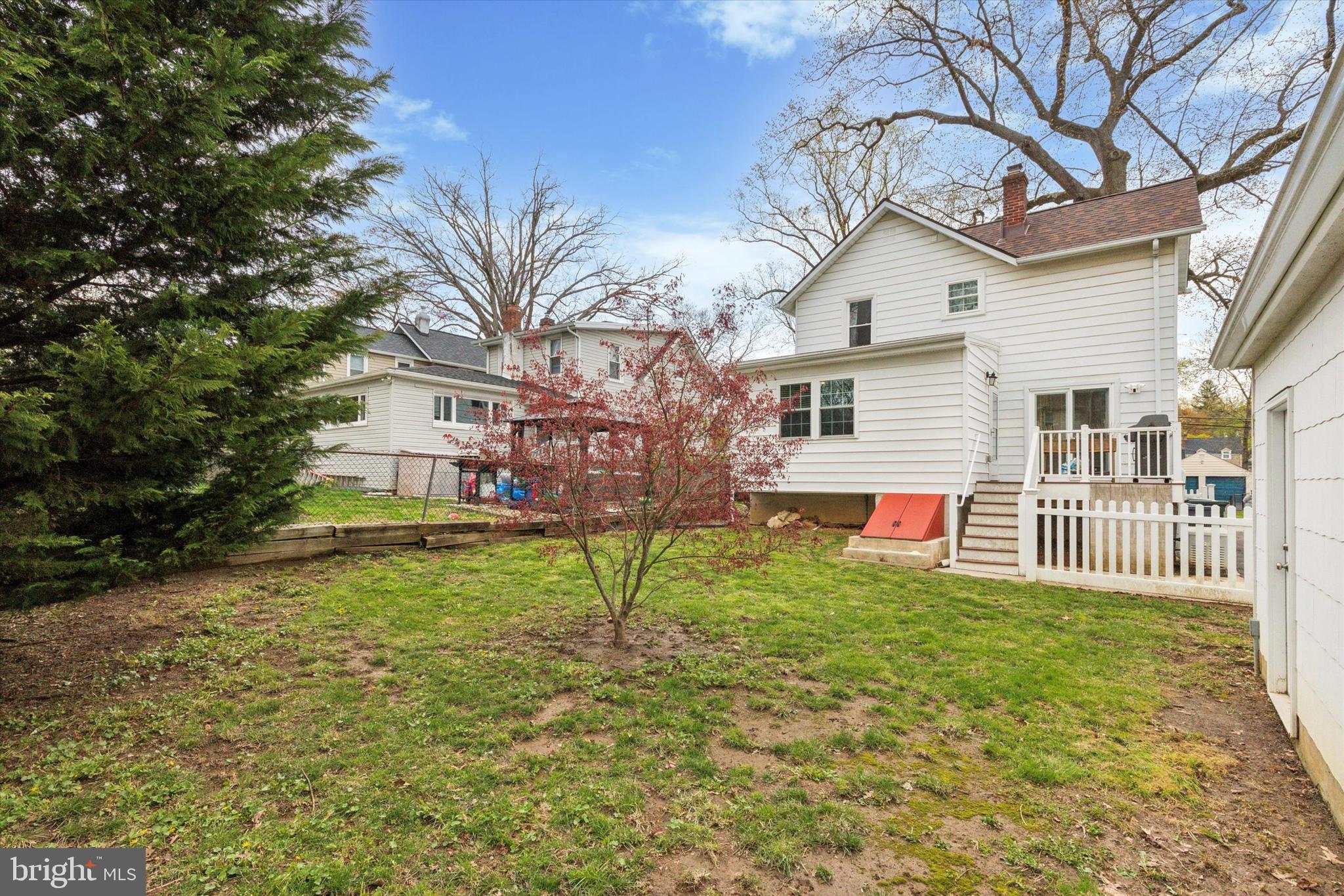 326 Maple Avenue Glenside, PA 19038 - Photo 24 of 25 a view of a house with a yard and a wooden deck