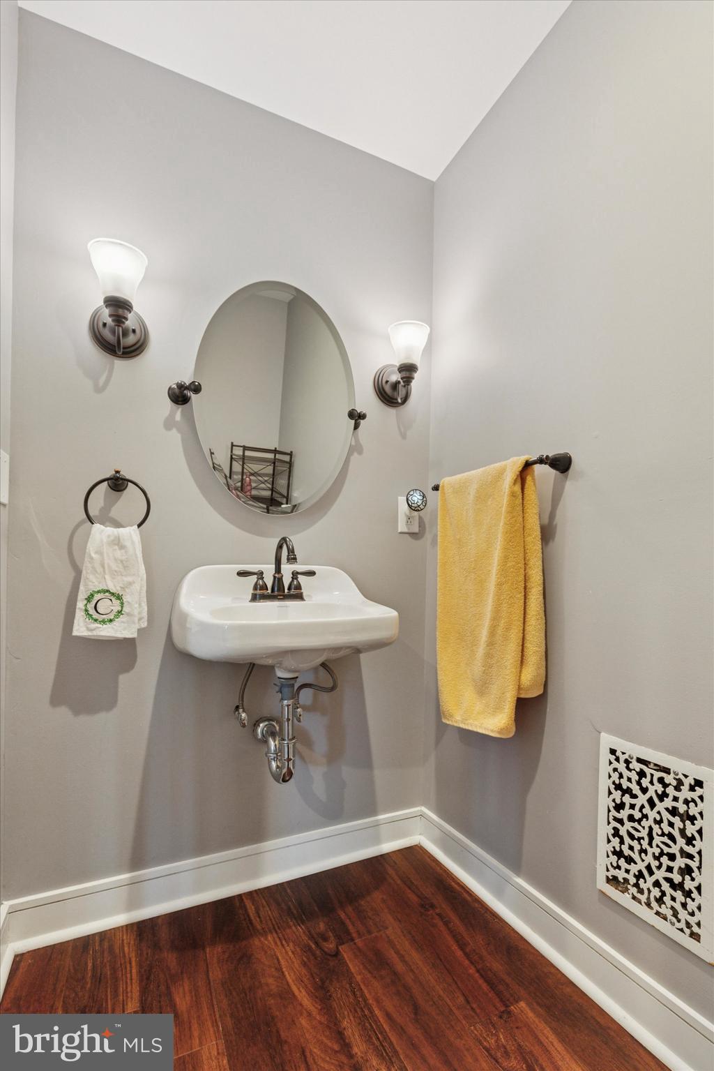 326 Maple Avenue Glenside, PA 19038 - Photo 10 of 25 a bathroom with a sink and mirror