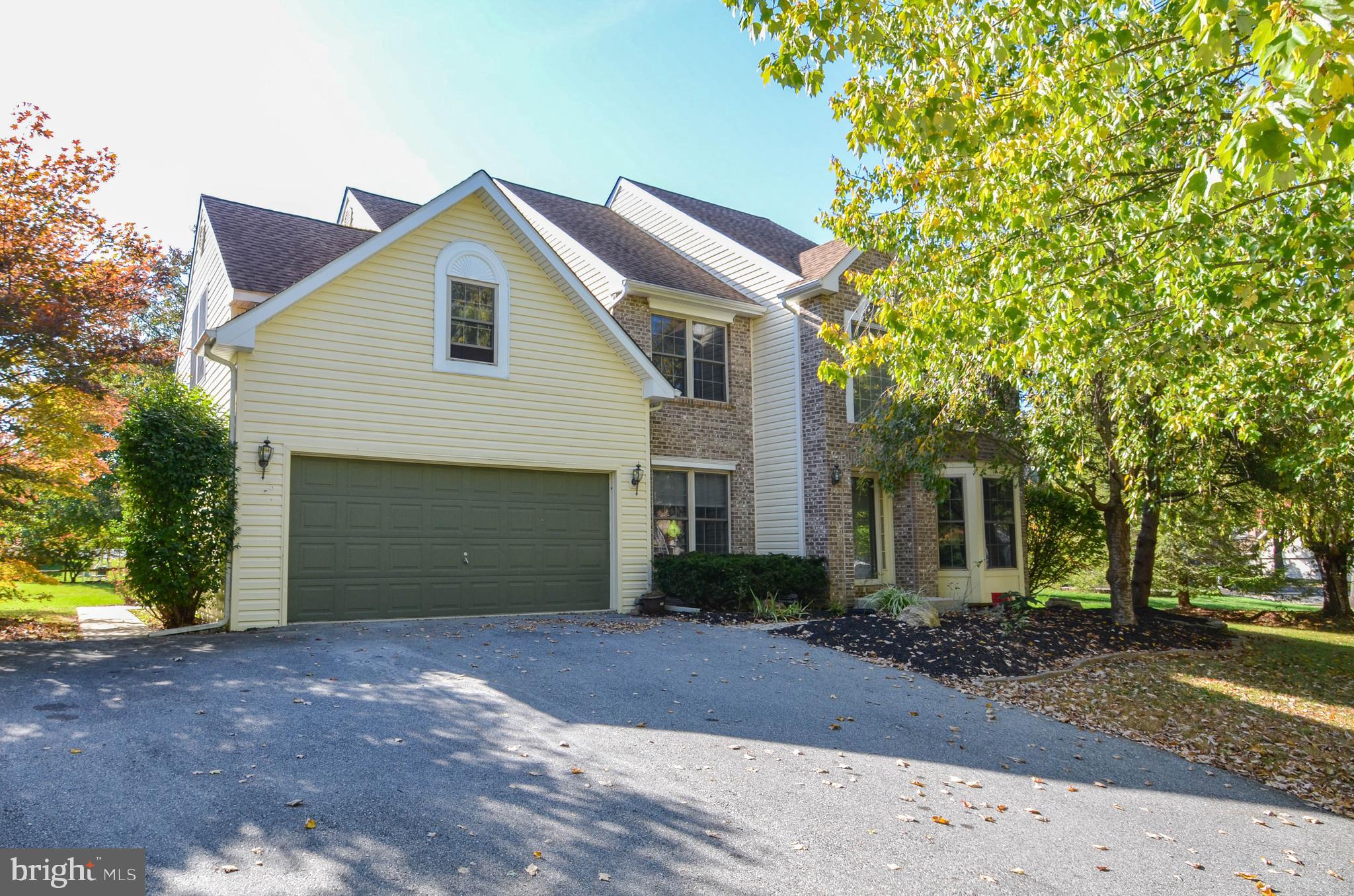 5382 Princeton Road Macungie, PA 18062 - Photo 1 of 33 a front view of a house with a yard and trees