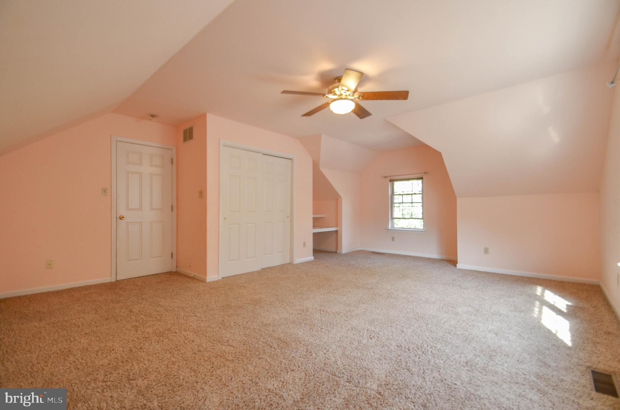 5382 Princeton Road Macungie, PA 18062 - Photo 18 of 33 an empty room with windows and fan