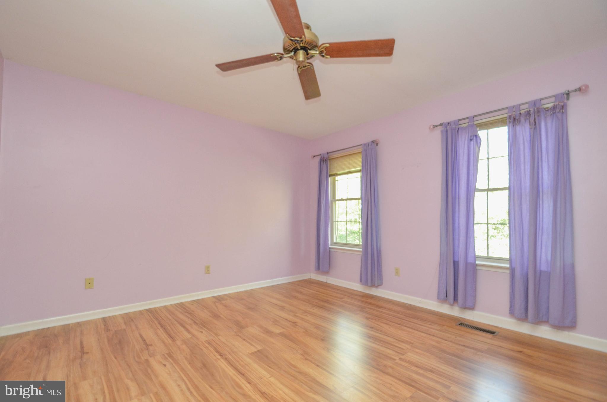 5382 Princeton Road Macungie, PA 18062 - Photo 21 of 33 an empty room with windows and fan