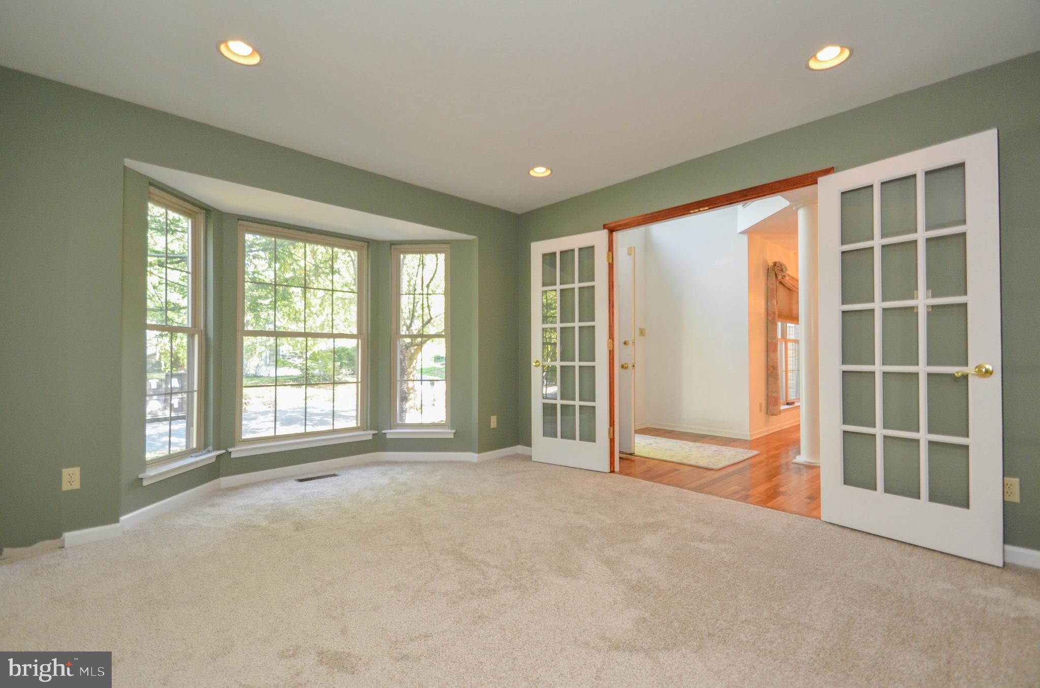 5382 Princeton Road Macungie, PA 18062 - Photo 10 of 33 a view of an empty room with a window and kitchen view