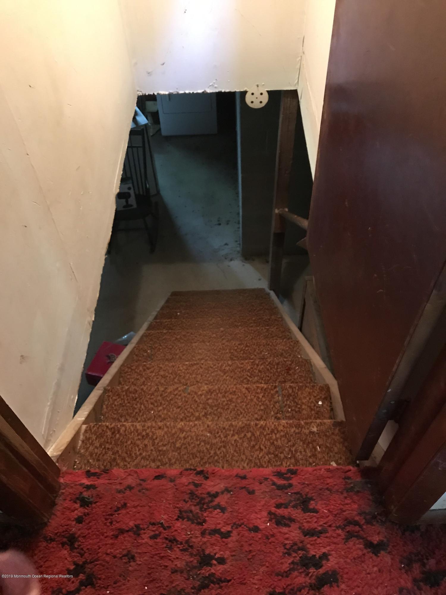 70 Pinewood Road Howell, NJ 07731 - Photo 15 of 22 a view of wooden staircase