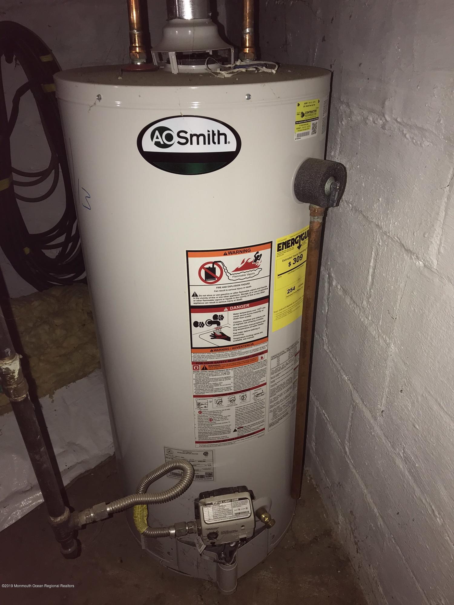70 Pinewood Road Howell, NJ 07731 - Photo 17 of 22 a view of water heater