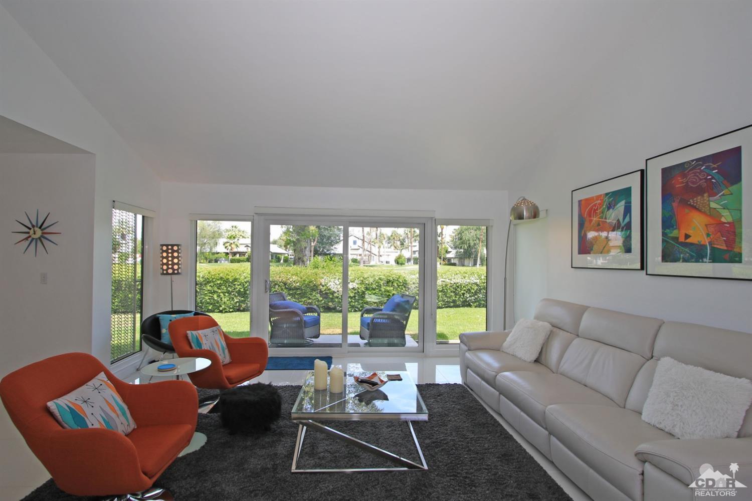 6012 East Driver Road Palm Springs, CA 92264 - Photo 11 of 47 a living room with furniture and a large window