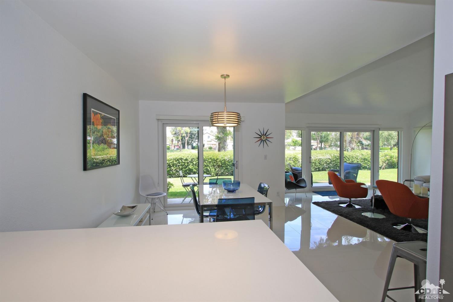 6012 East Driver Road Palm Springs, CA 92264 - Photo 15 of 47 a living room with furniture and a large window