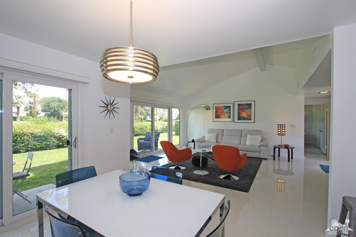 6012 East Driver Road Palm Springs, CA 92264 - Photo 18 of 47 a dining room with furniture and window
