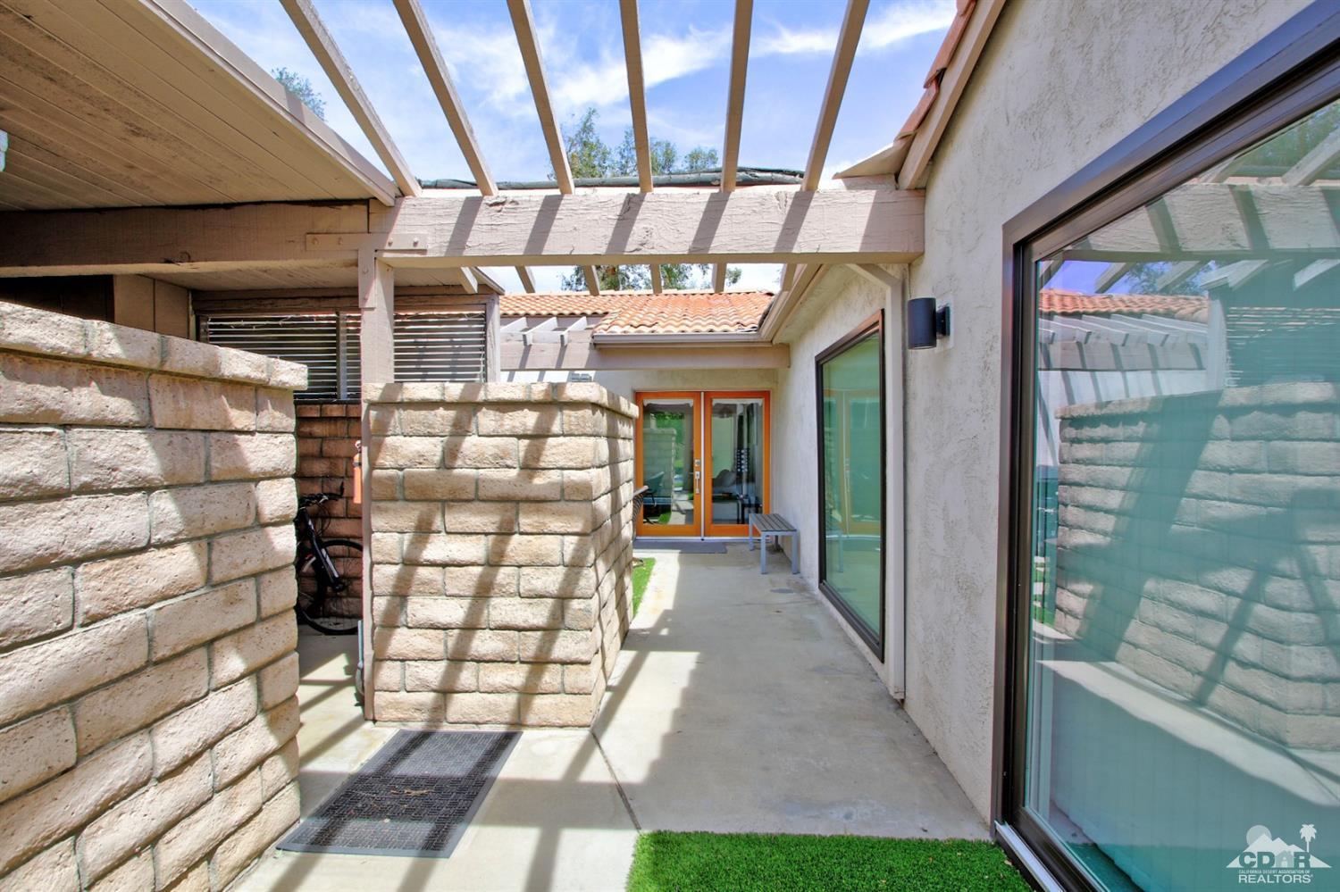 6012 East Driver Road Palm Springs, CA 92264 - Photo 3 of 47 a view of a porch with a shower