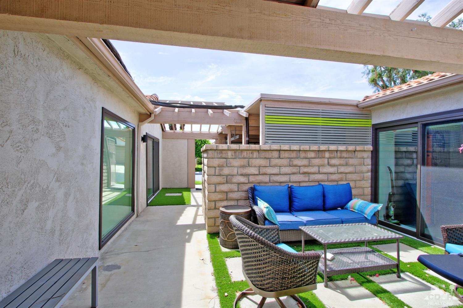 6012 East Driver Road Palm Springs, CA 92264 - Photo 5 of 47 a building outdoor space with patio furniture