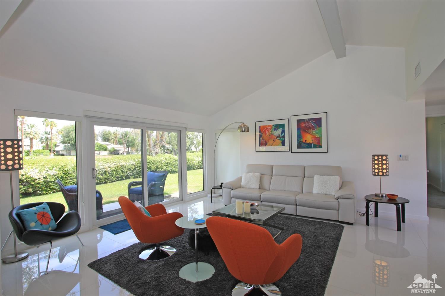 6012 East Driver Road Palm Springs, CA 92264 - Photo 7 of 47 a living room with furniture and a large window