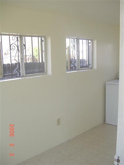 4072 North Flowing Wells Road, Unit 1 Tucson, AZ 85705 - Photo 4 of 8 a view of empty room with windows