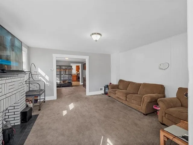 a living room with furniture and a couch