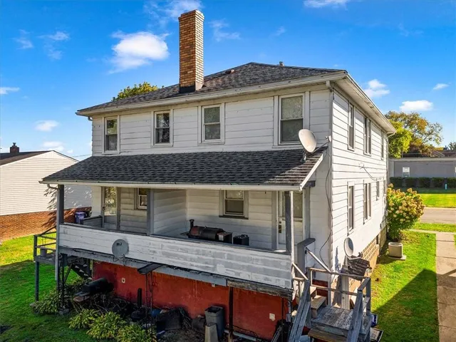 a front view of house with yard outdoor seating and entertaining space