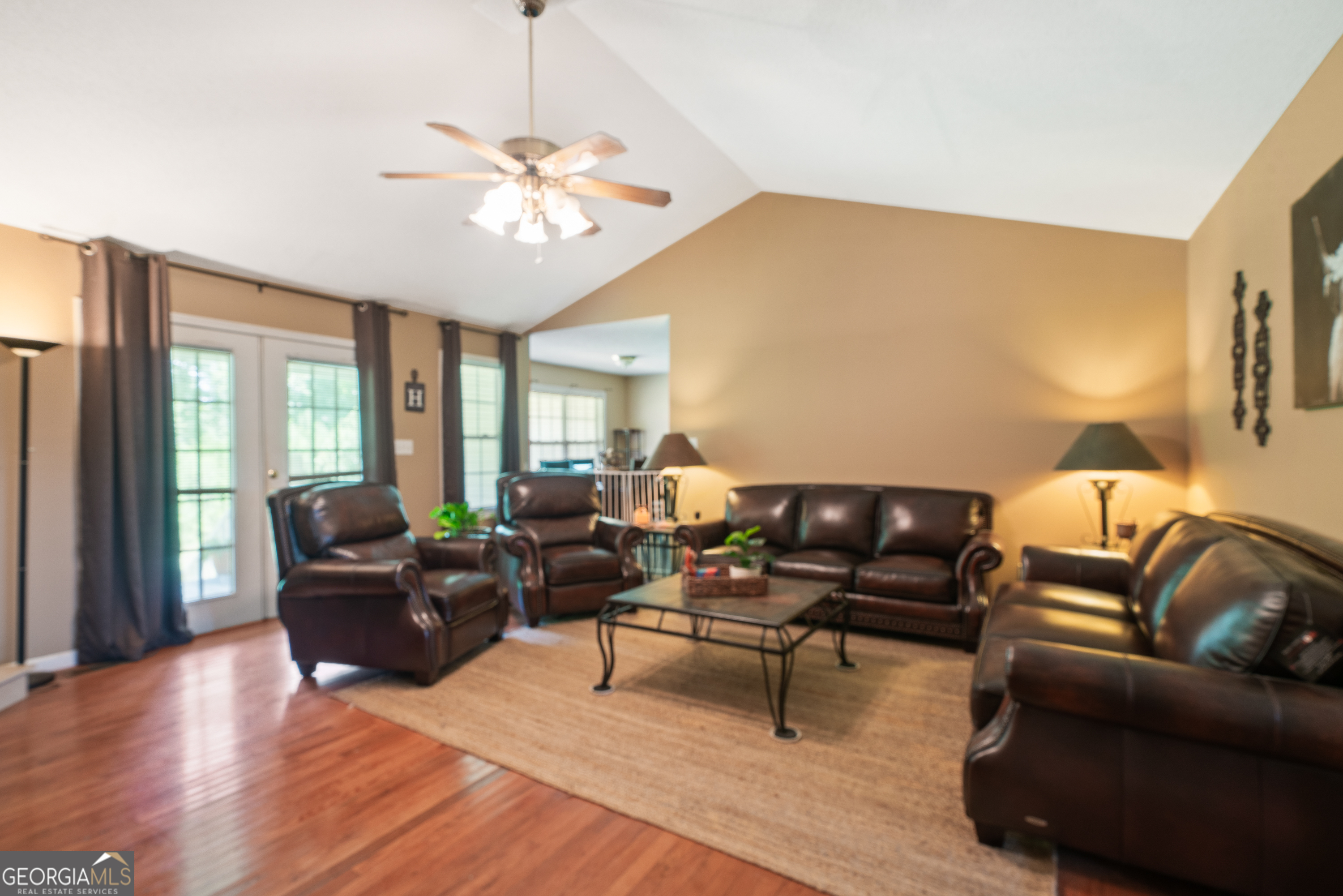 193 Virginia Avenue Gray, GA 31032 - Photo 11 of 48 a living room with furniture and a large window