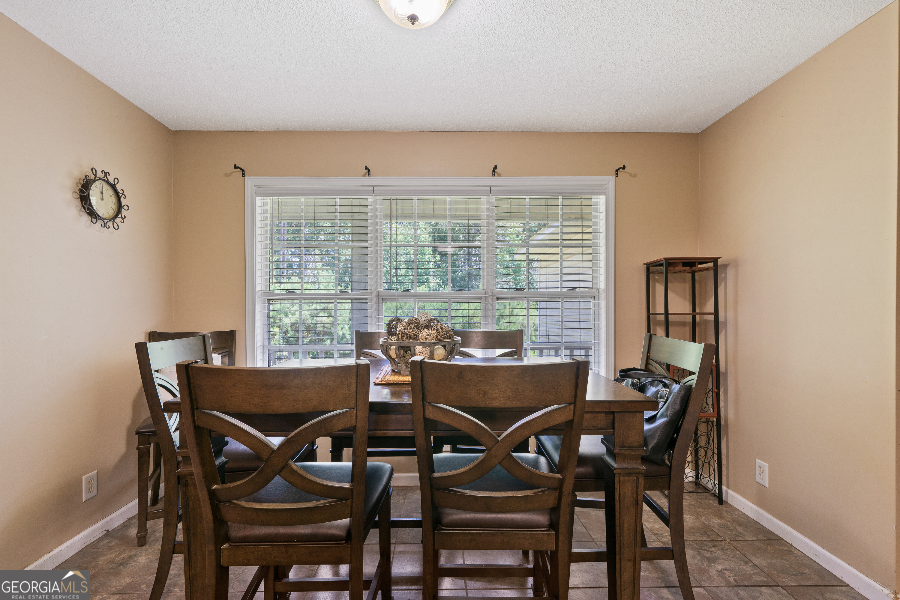 193 Virginia Avenue Gray, GA 31032 - Photo 27 of 48 a view of a dining room with furniture and a window