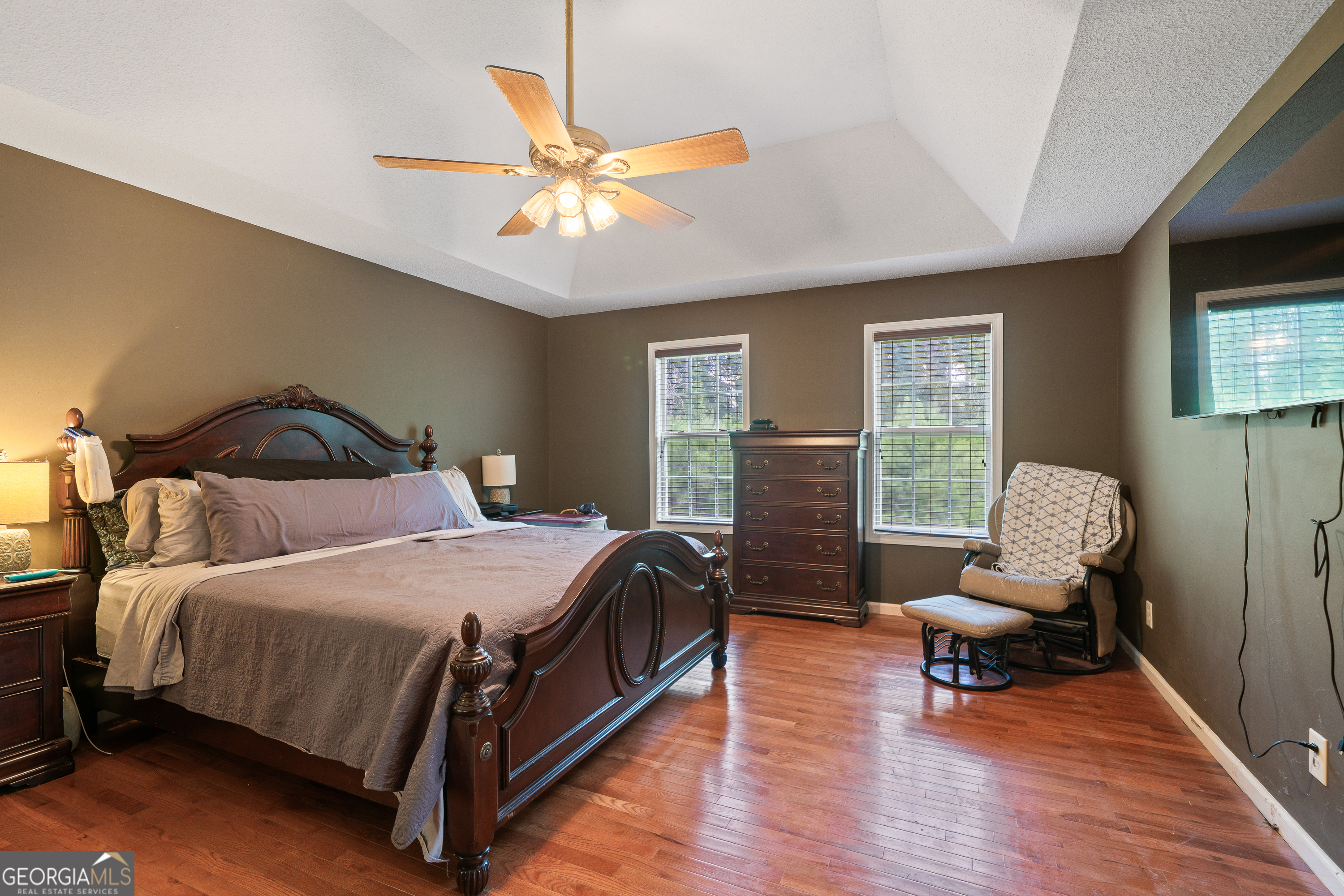 193 Virginia Avenue Gray, GA 31032 - Photo 37 of 48 a bedroom with a bed a couch and dresser