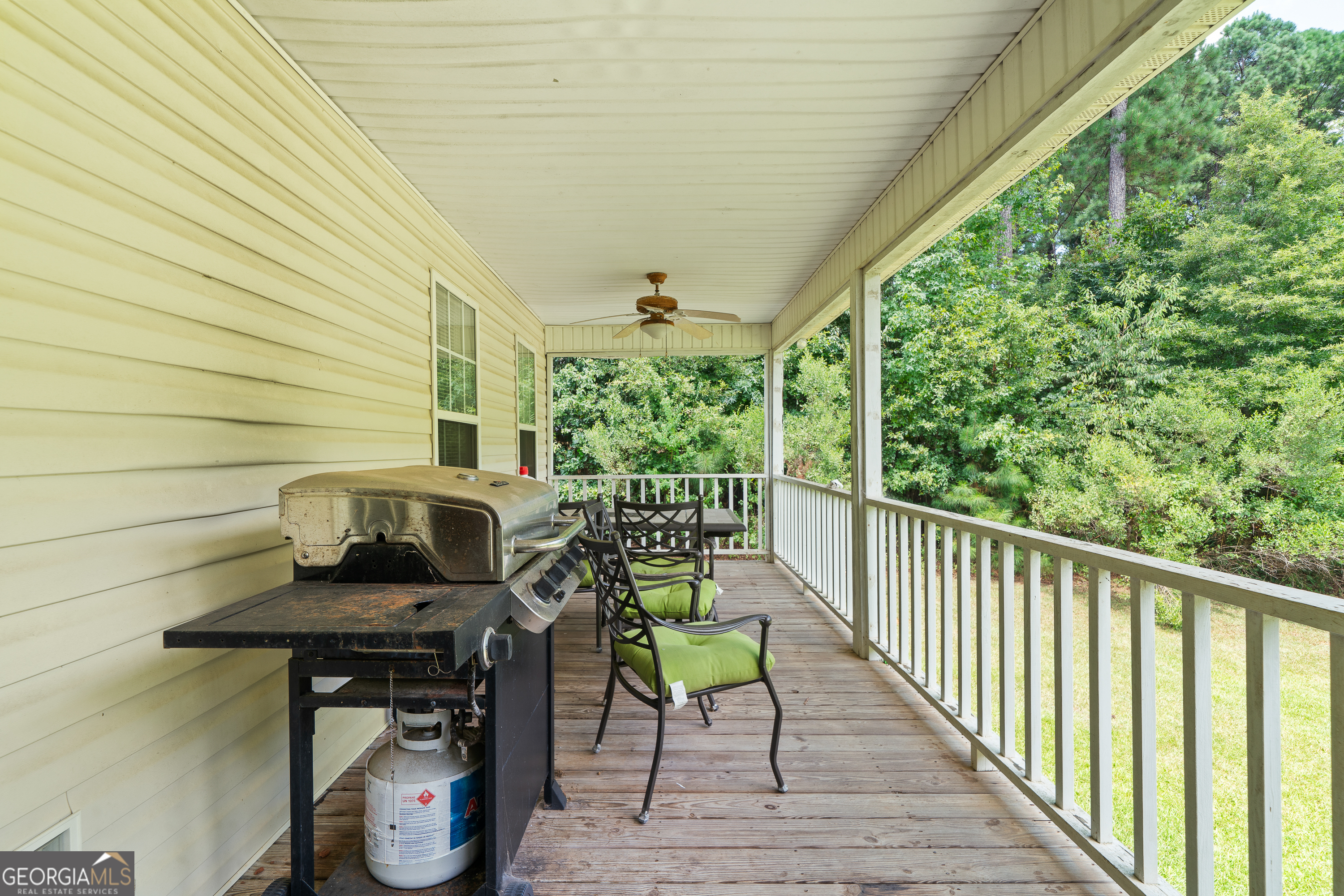 193 Virginia Avenue Gray, GA 31032 - Photo 40 of 48 a view of a chairs and table on the balcony