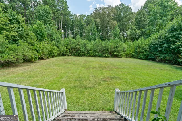 a view of a balcony with an outdoor space