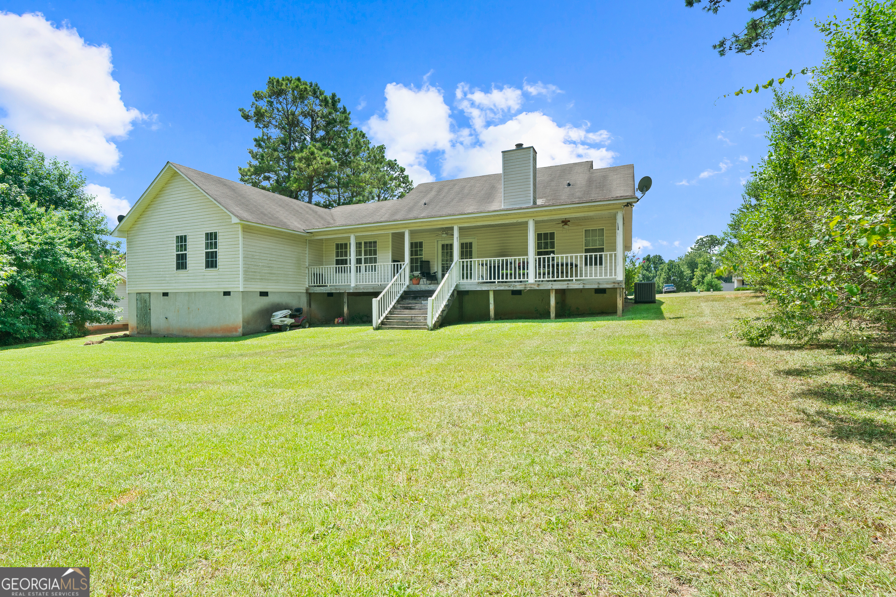 193 Virginia Avenue Gray, GA 31032 - Photo 46 of 48 a view of a house with a yard and potted plants