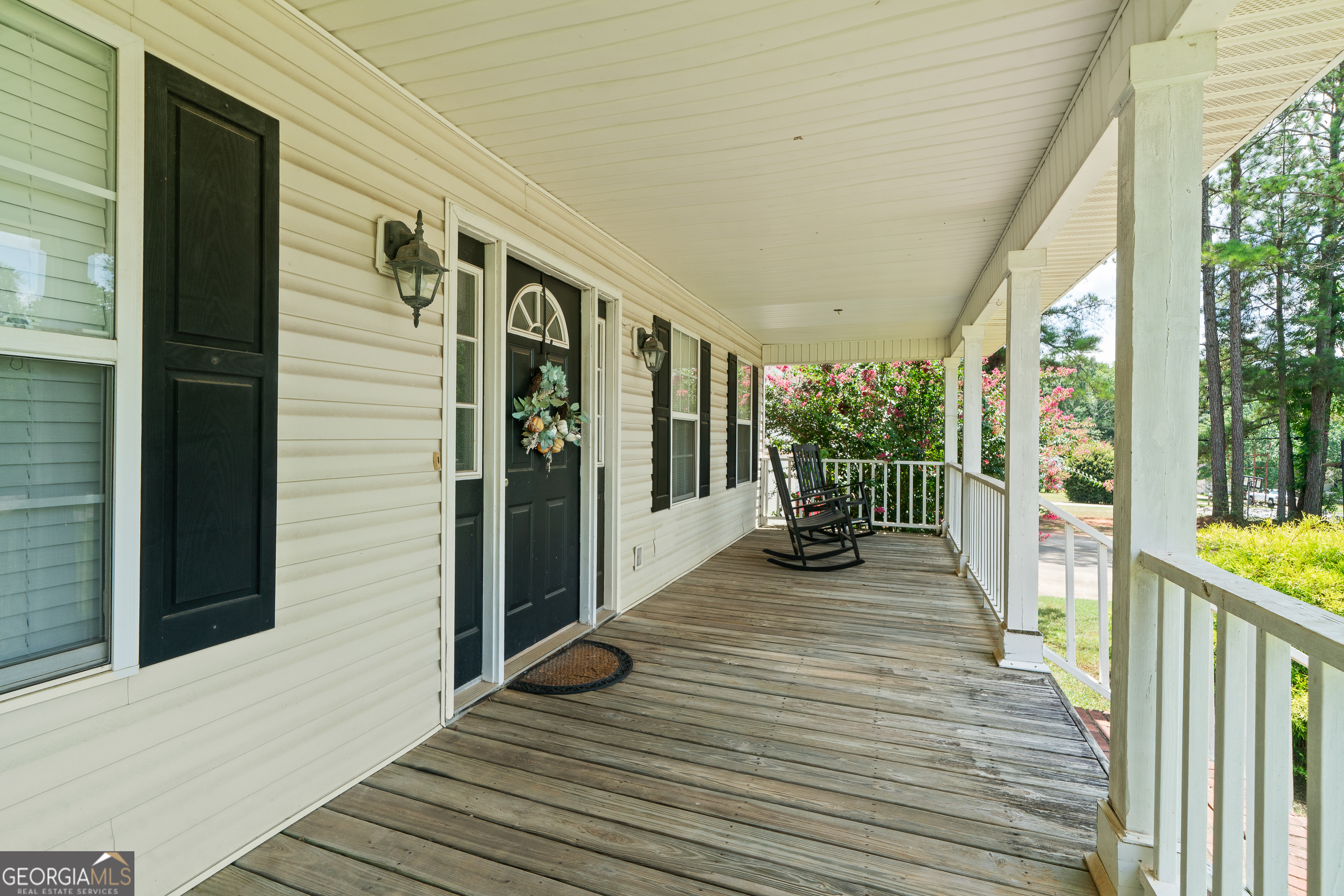 193 Virginia Avenue Gray, GA 31032 - Photo 5 of 48 a view of a balcony with chairs