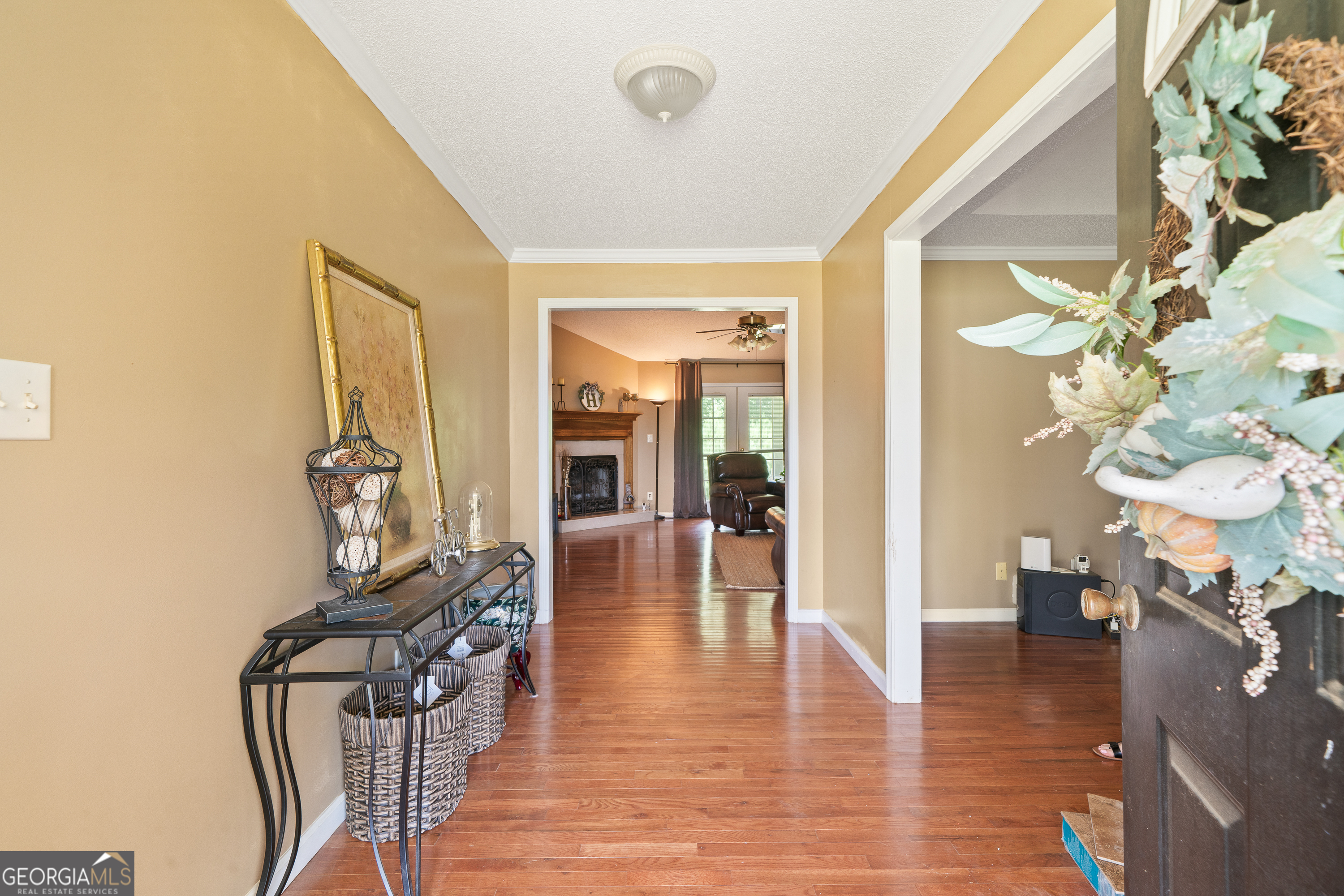193 Virginia Avenue Gray, GA 31032 - Photo 7 of 48 a view of a livingroom with furniture and hardwood floor