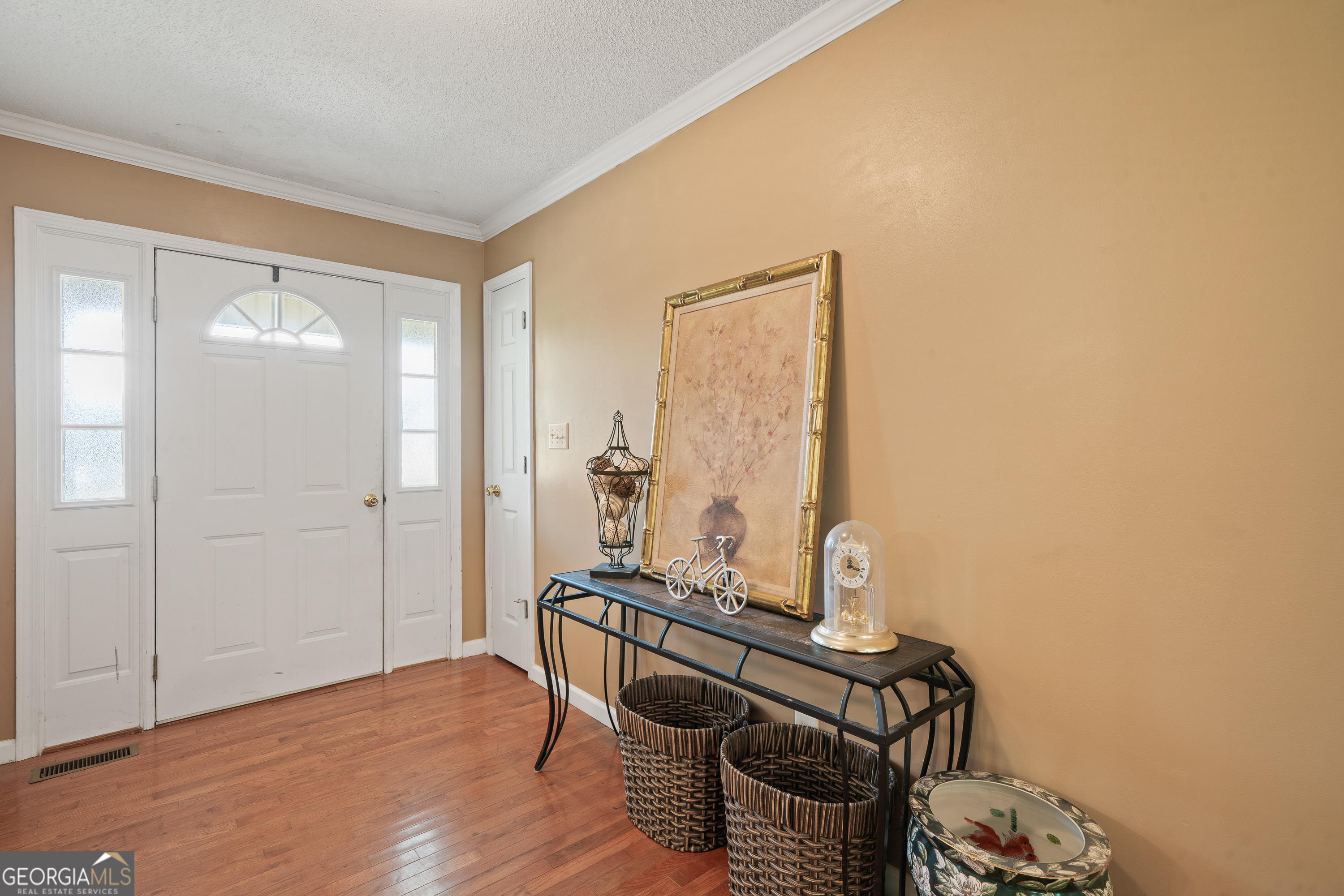 193 Virginia Avenue Gray, GA 31032 - Photo 9 of 48 a room with furniture and wooden floor