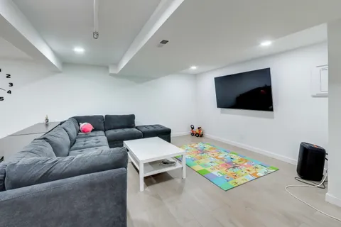 a room with furniture pool table and a table