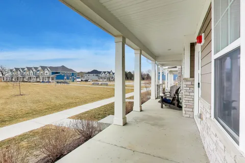 a view of a balcony with an ocean view