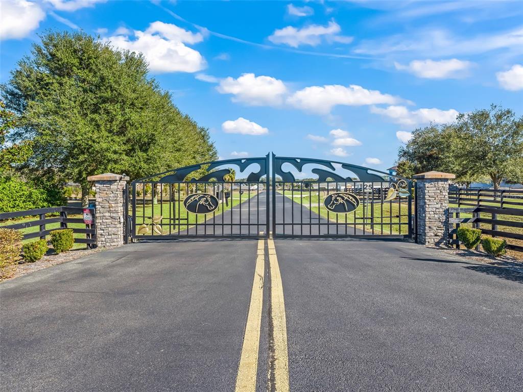 54 Northwest 54th Loop Ocala, FL 34482 - Photo 13 of 13 a view of a street with a houses