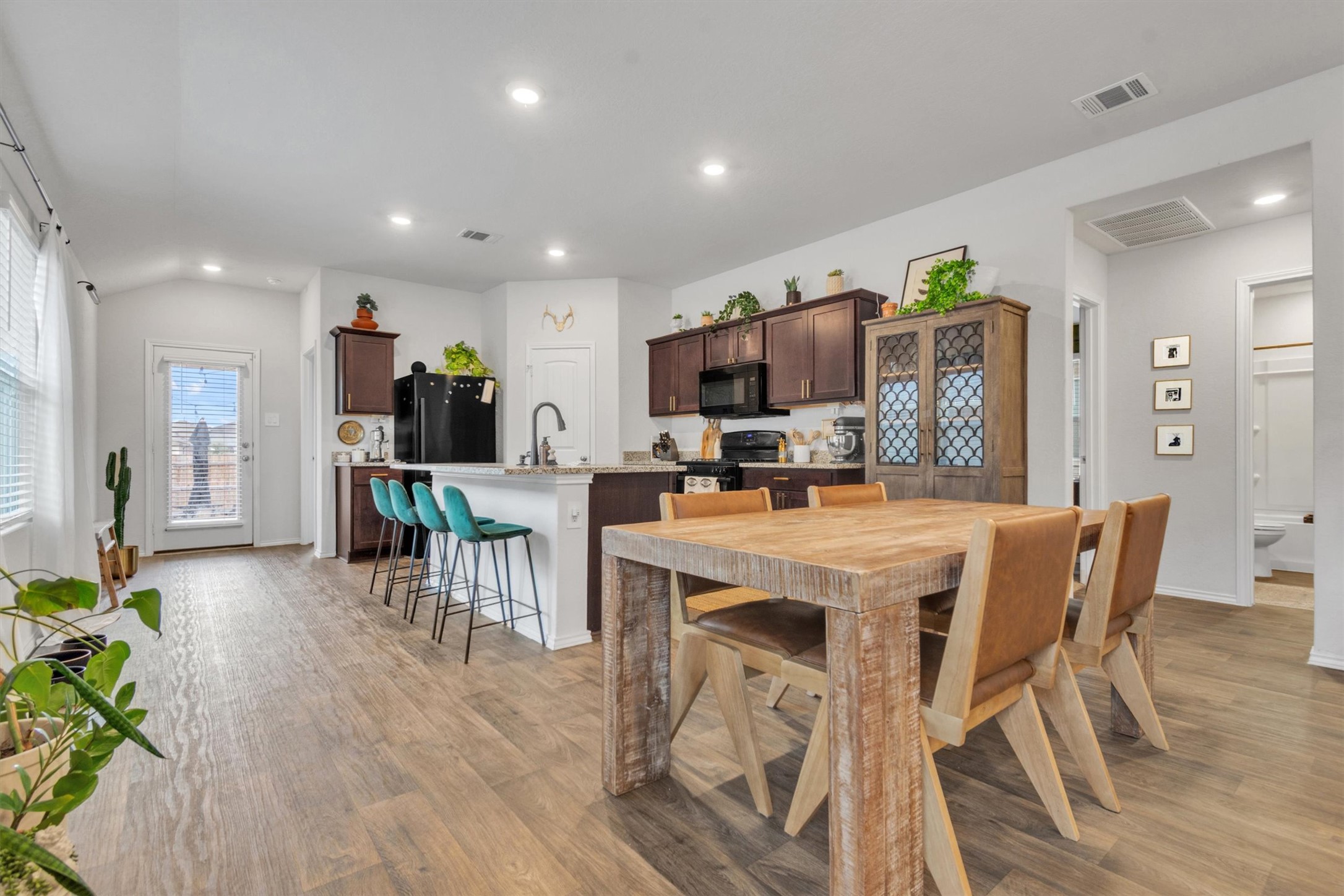 204 Calgary Lane San Marcos, TX 78666 - Photo 7 of 23 Dining area provides room for a large table.