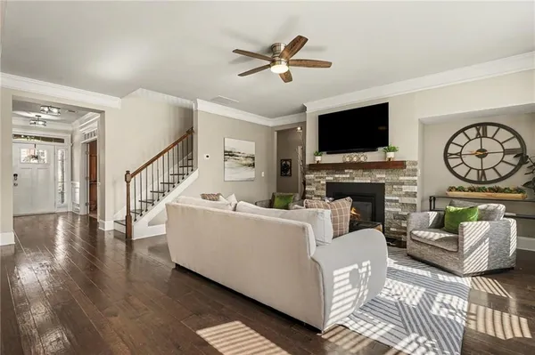 a view of a room with wooden floor